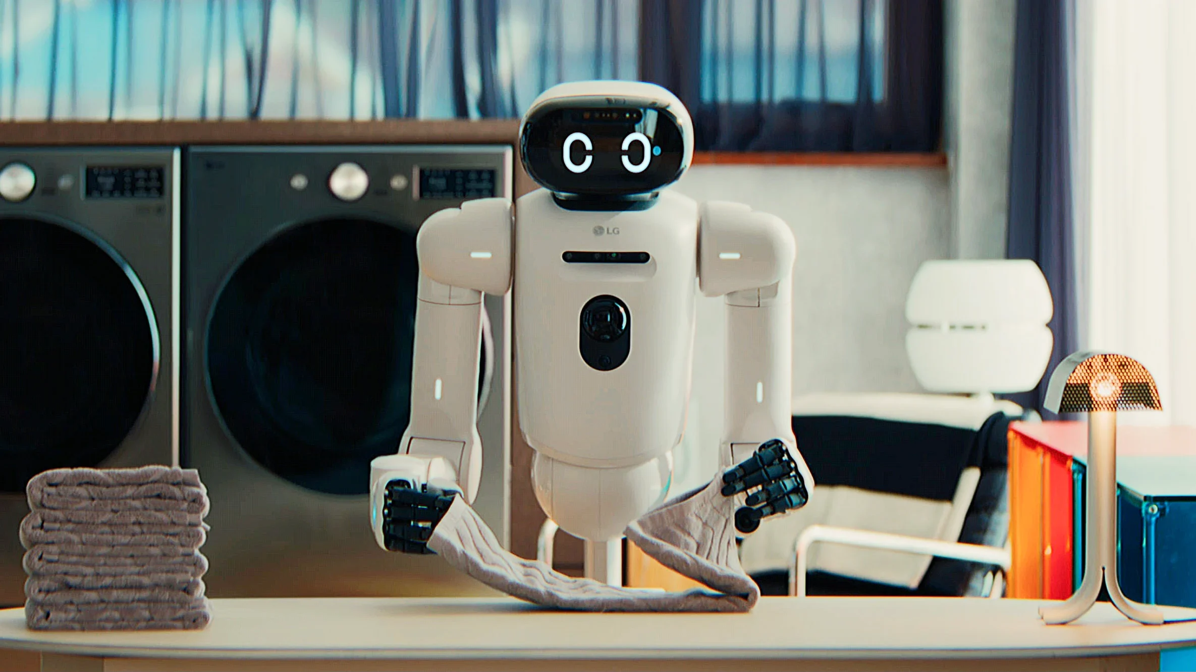 LG's household robot CLOiD folding clothes.