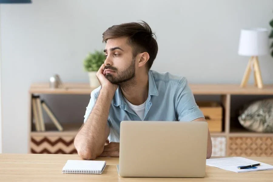 remote-working-man-distracted-meeting.jpg