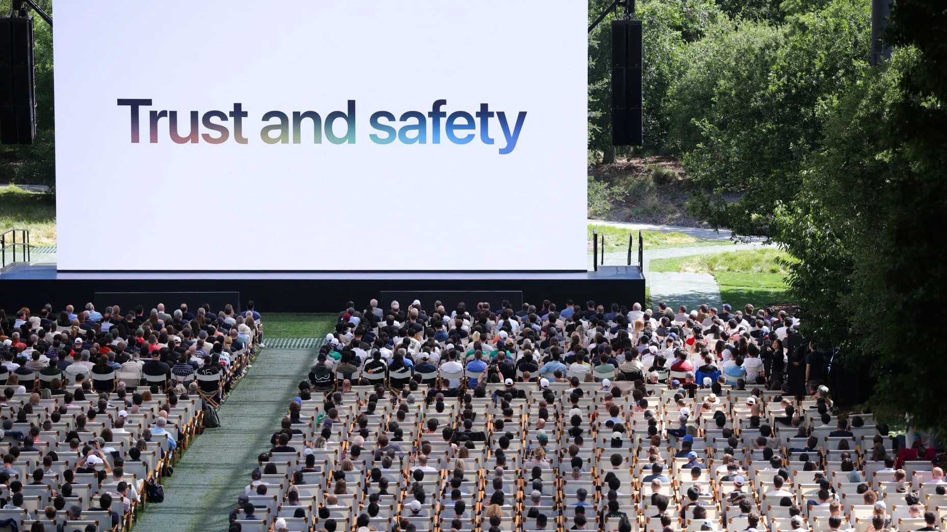 Attendees watch a presentation during Apple's annual Worldwide Developers Conference in Cupertino, California, U.S., June 8, 2026. REUTERS/Carlos Barria